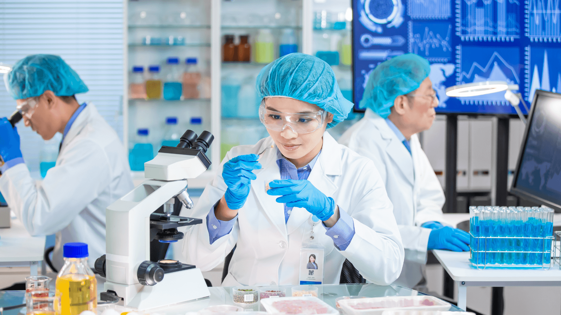 Chemist with microscope